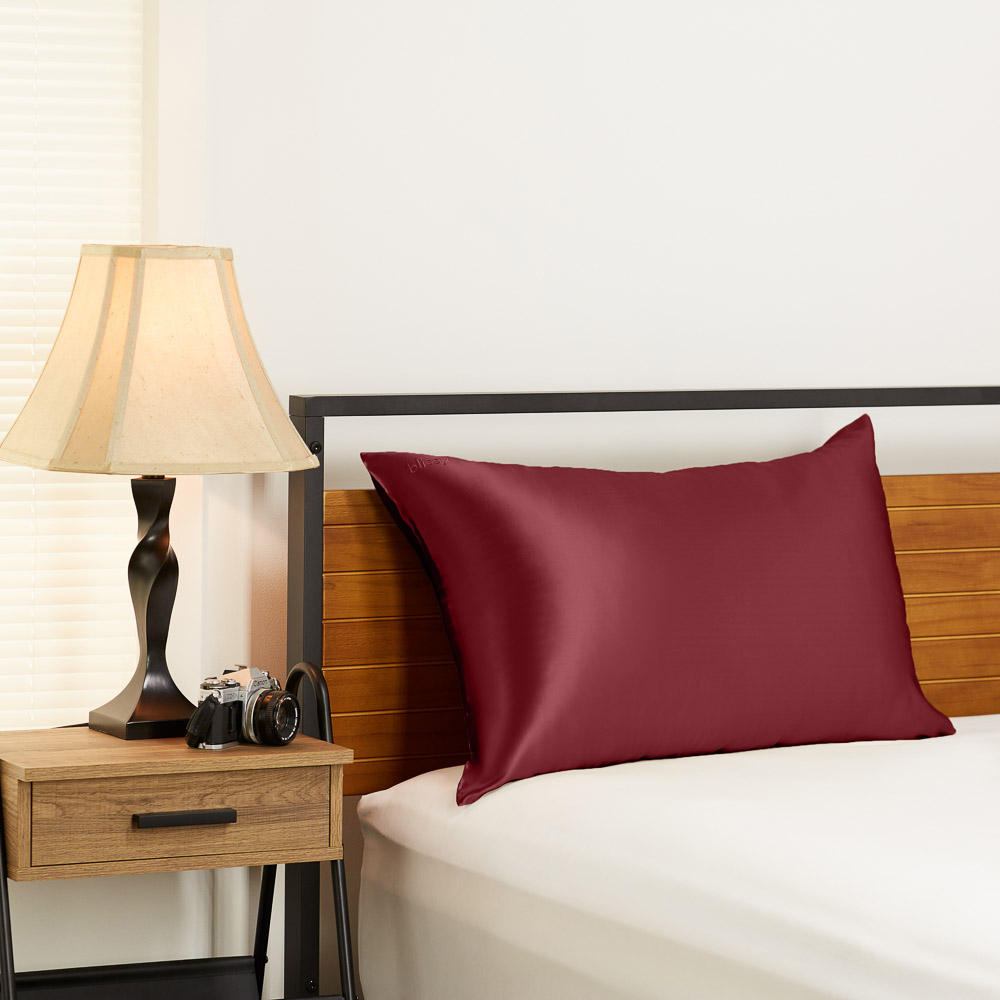 Blissy burgundy pillowcase in the bedroom