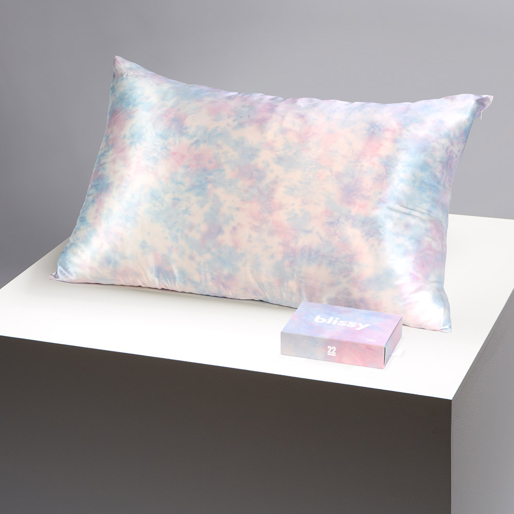 Blissy tie dye pillowcase on a table