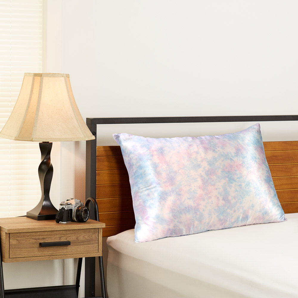 Tie dye Blissy silk pillowcase in a bedroom