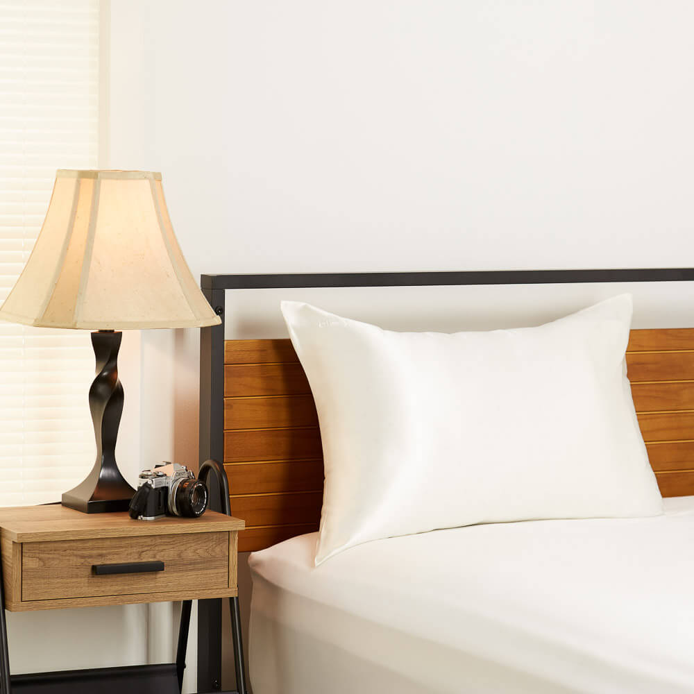 White Blissy silk pillowcase in a bedroom