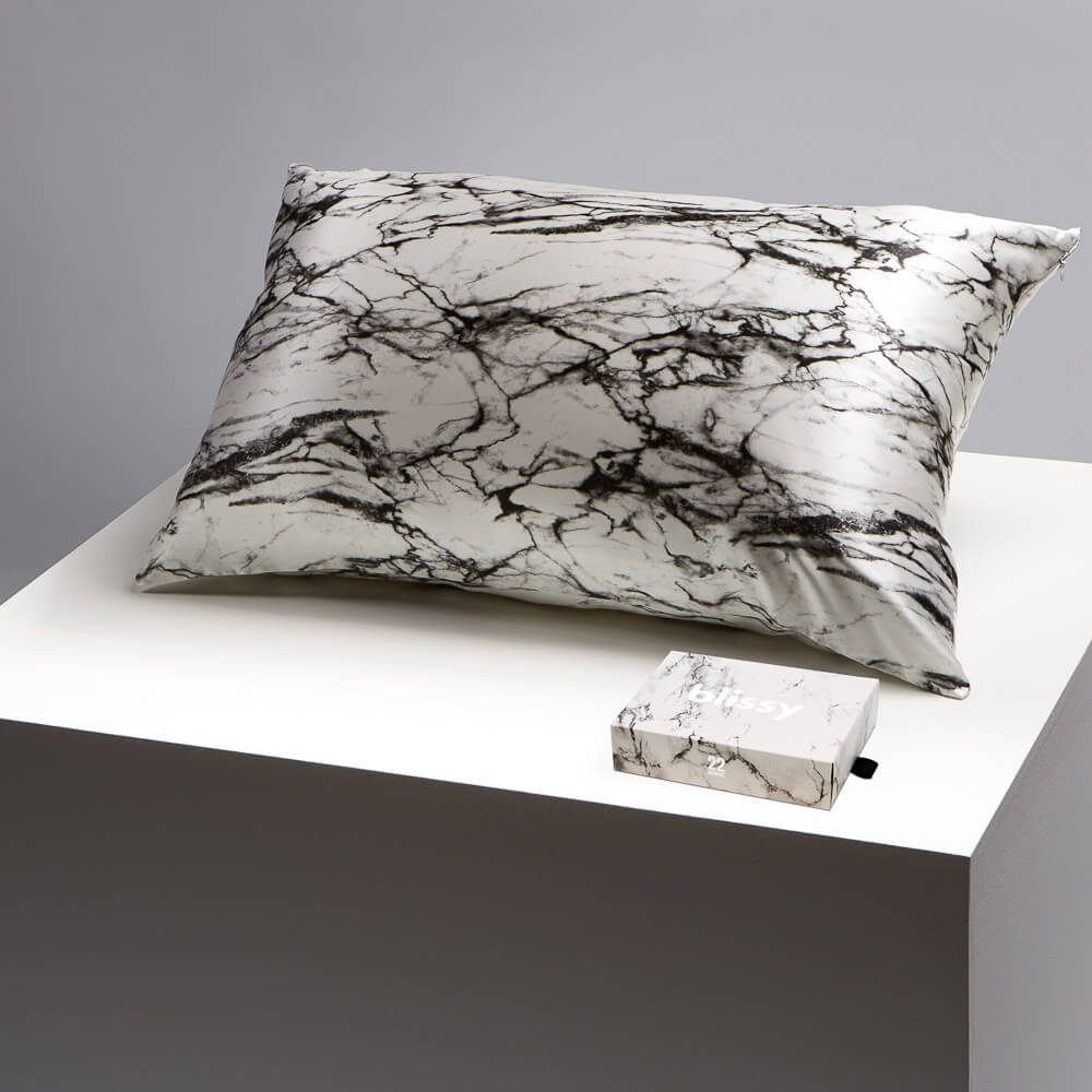 Blissy marble pillowcase on a table